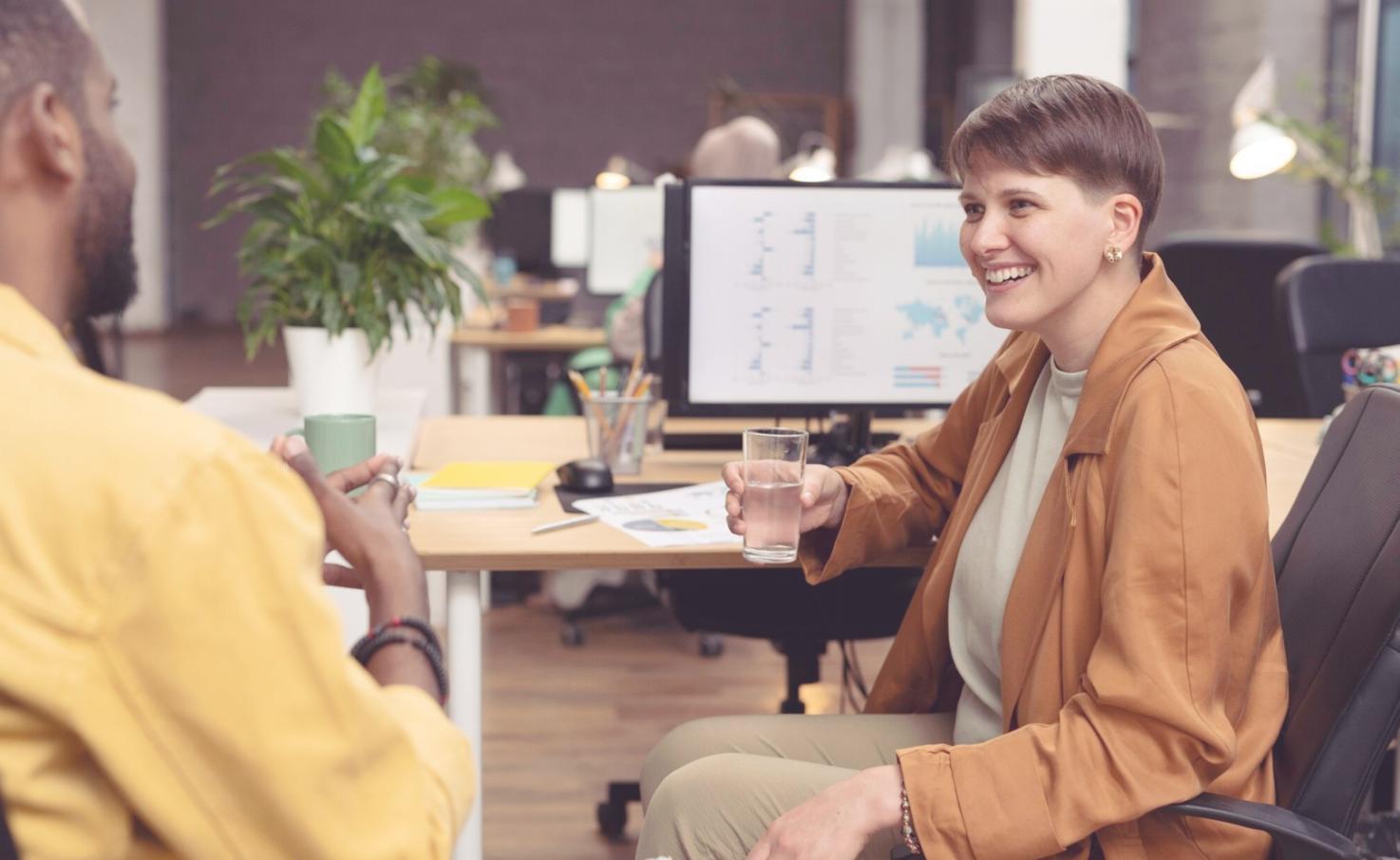 Financial planning workshop session with franchise owners reviewing cash flow documents